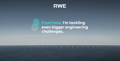 A vast sea with wind turbines in the background. The text encourages tackling bigger engineering challenges.