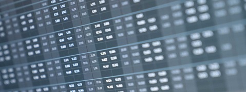 A computer screen displays a data overview with numbers and values arranged in multiple rows and columns.