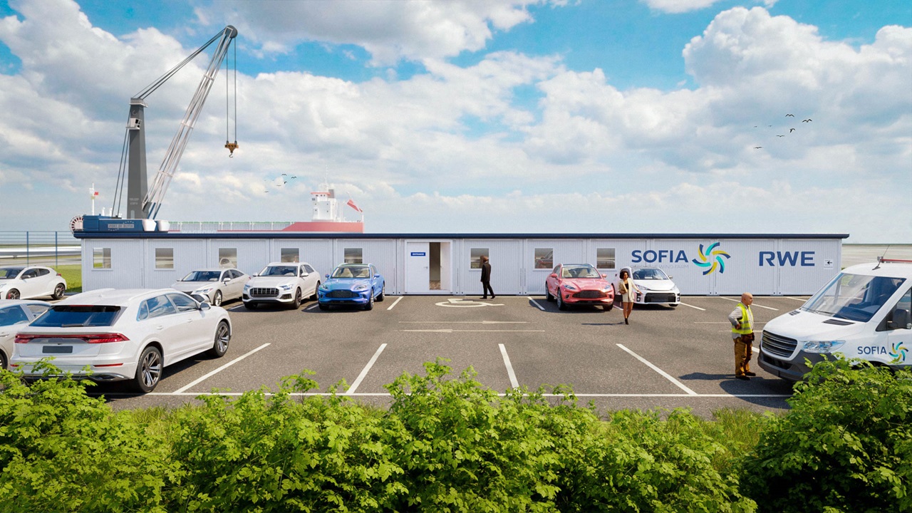 A parking area with several vehicles and a building labelled 'Sofia RWE'. A crane is visible behind the building.