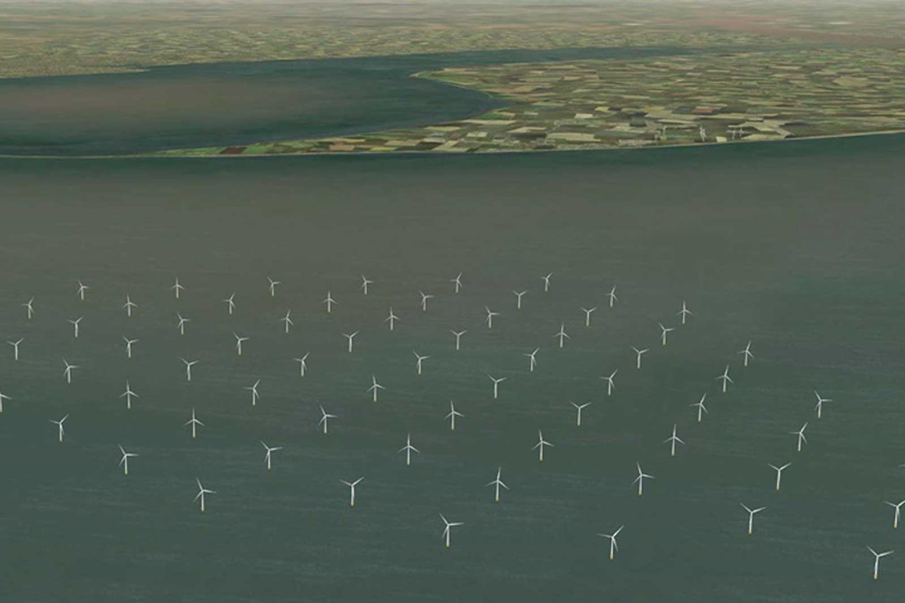 An offshore wind farm with numerous turbines in the water, surrounded by green fields and rolling landscapes in the background.