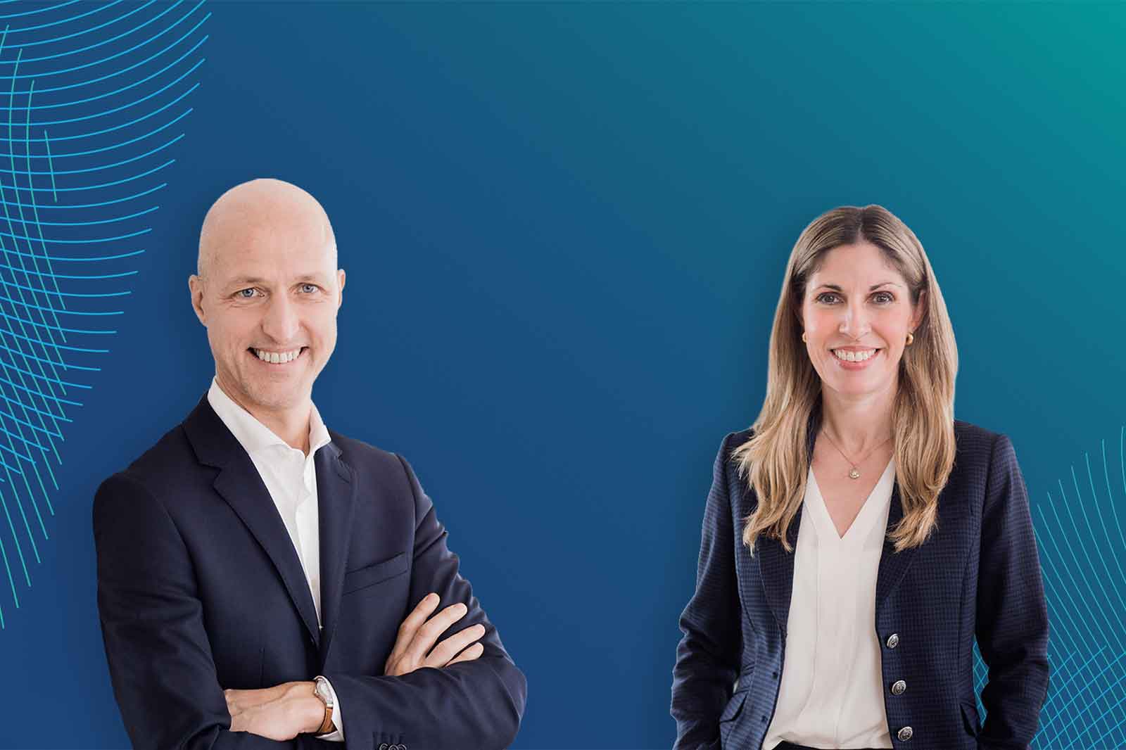 Two individuals stand against a blue background with line patterns. The person on the left is wearing a dark suit.