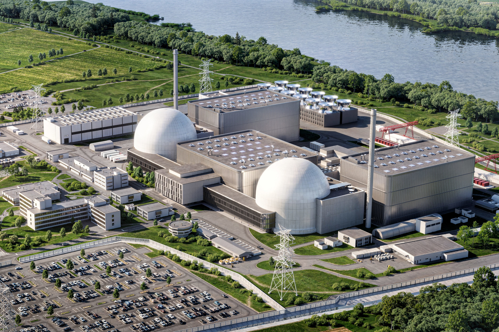 Zwei weiße, kuppelförmige Gebäude stehen im Vordergrund einer großen grauen Industrieanlage aus Beton und Metall, am Flussufer mit Parkplätzen und Übertragungsmasten.