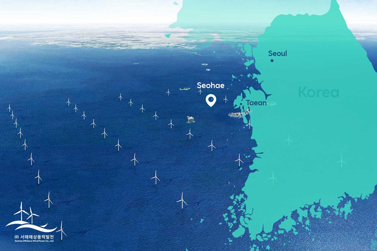 An aerial view of offshore wind turbines in the Seohae Sea, with a map highlighting Seoul and nearby locations in Korea.