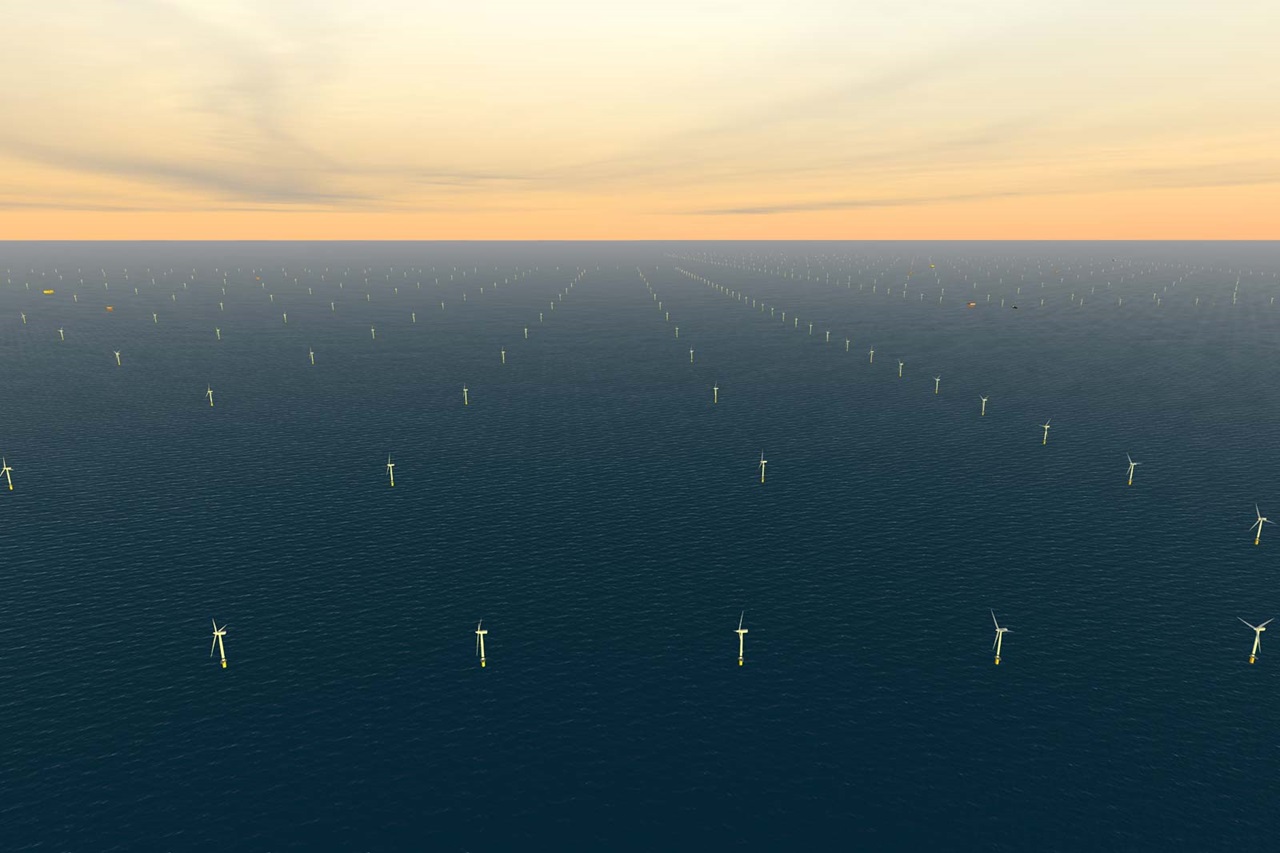 Weitreichendes Bild eines Offshore-Windparks mit zahlreichen Windkraftanlagen im Wasser unter einem bewölkten Himmel.