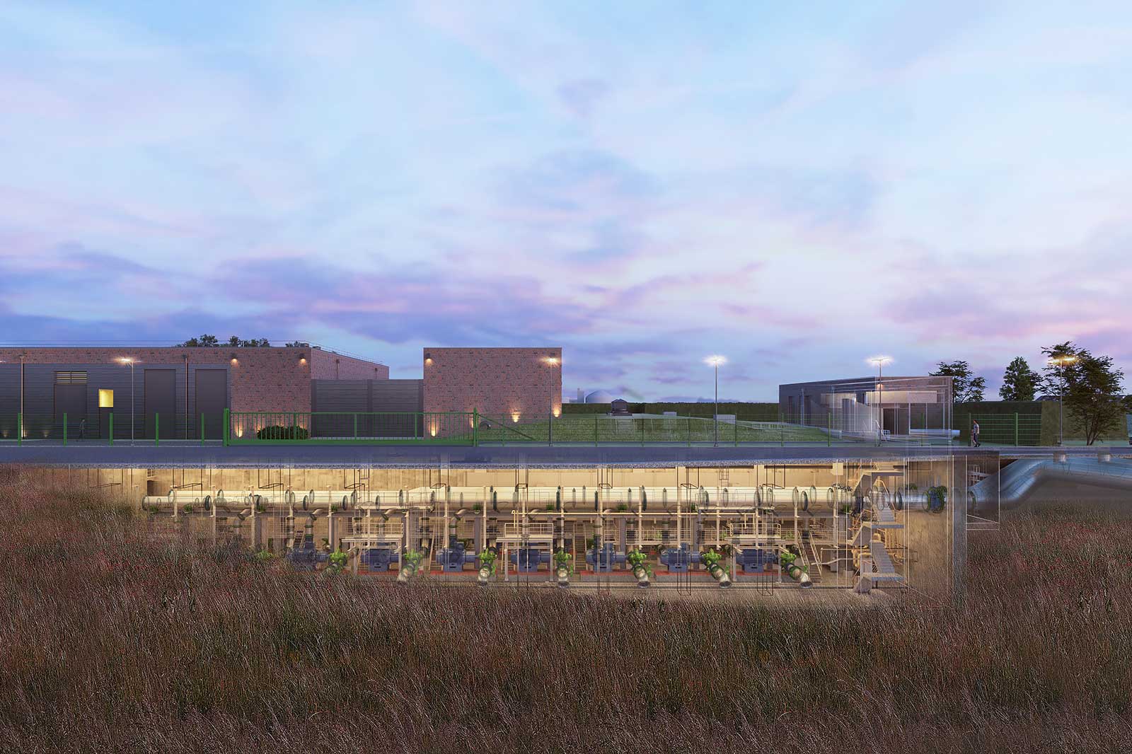 Querschnitt zeigt unterirdische Pumpstation mit Rohren und Maschinen unter einem Grasfeld, im Hintergrund Backsteingebäude bei Dämmerung.