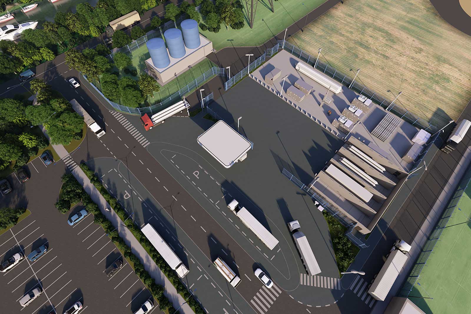 An aerial view of a logistics centre featuring lorries, roadways, parking spaces, and storage units.